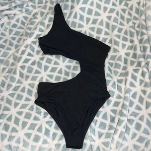 Black asymmetrical one piece